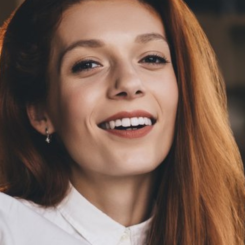 cheerful-woman-with-tablet-in-modern-workspace-2024-01-18-11-51-26-utc-1.jpg